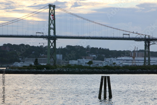 The bridge connects Halifax and Dartmouth, Nova Scotia. This is in the early evening. photo