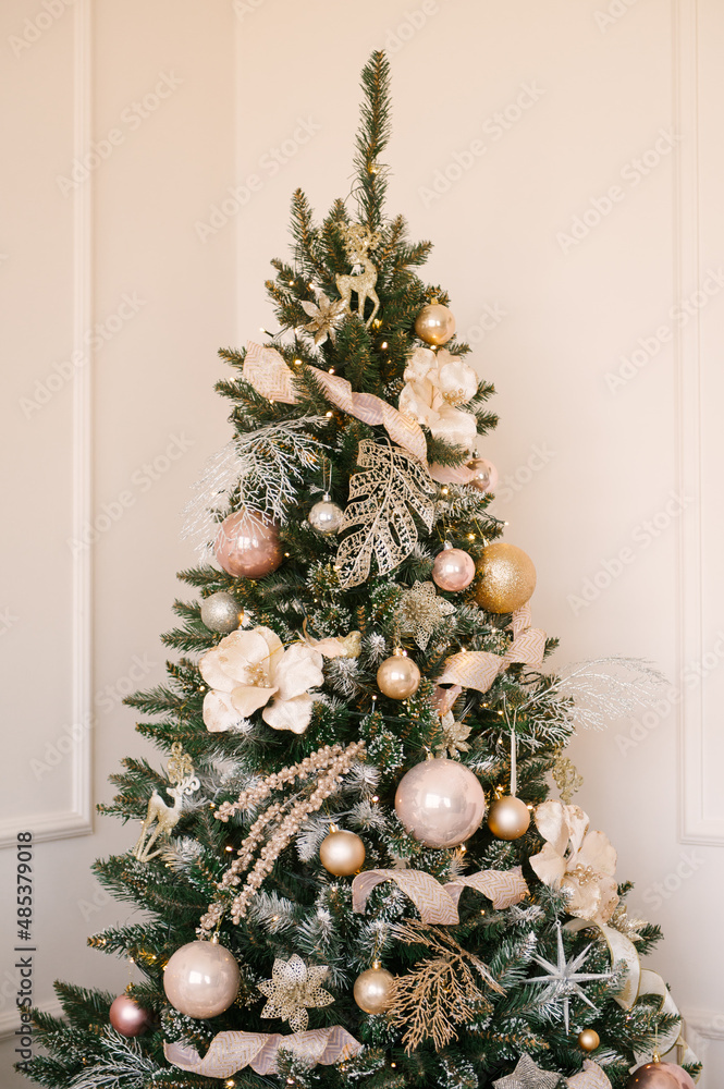 Christmas tree with beautiful toys, stylish Christmas and New Year decor