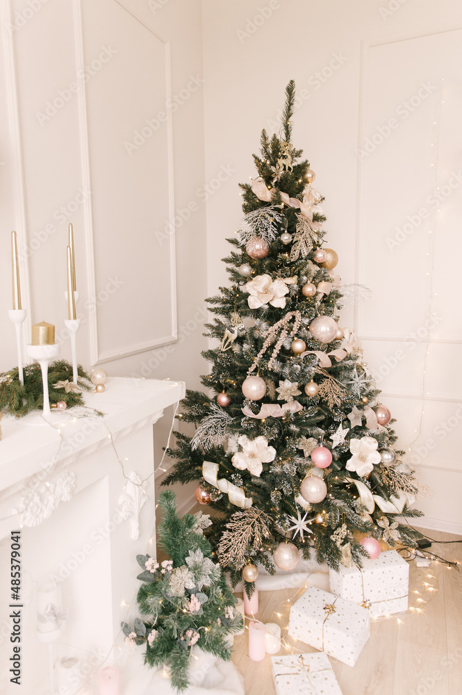 Christmas tree with beautiful toys, stylish Christmas and New Year decor Christmas tree with beautiful toys, stylish Christmas and New Year decor