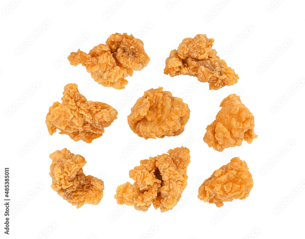 Fried popcorn chicken isolated on white background. Fried popcorn chicken isolated on white background.
