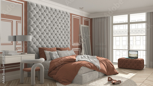 Classic bedroom in orange tones with modern furniture, parquet, velvet double bed, pillows and duvet, big window, side table with chair, round carpet and decors. Interior design idea