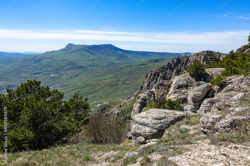 View of the Chatyr-Dag plateau from the top of the Demerdzhi mountain range in Crimea. Russia. View of the Chatyr-Dag plateau from the top of the Demerdzhi mountain range in Crimea. Russia.