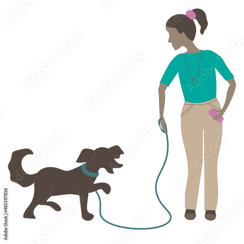 A girl walks a dog on a leash