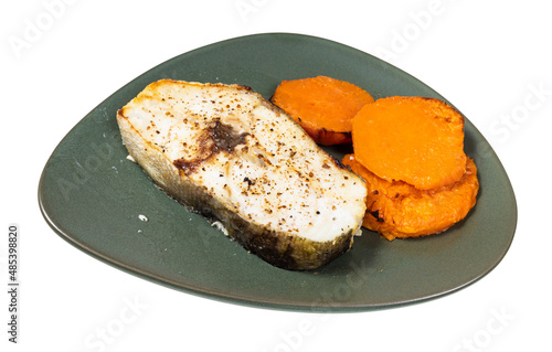 cod steak with boiled sweet potato isolated