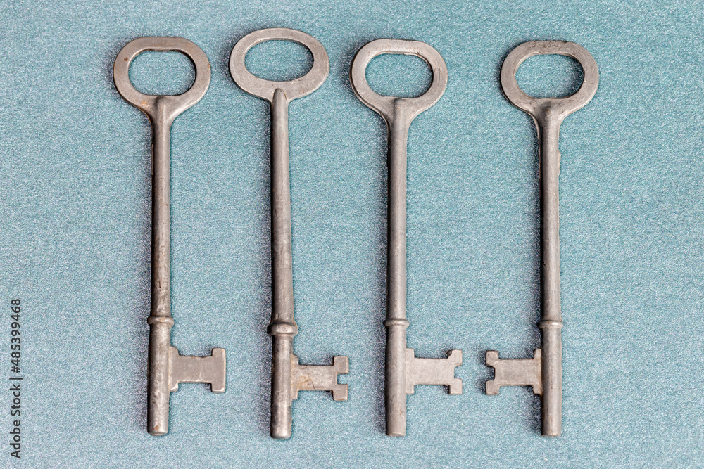 Four Skeleton Keys on a blue background Four Skeleton Keys on a blue background