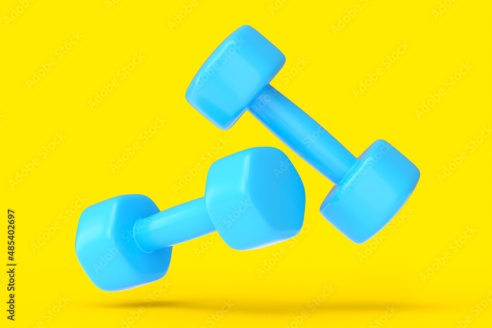 Pair of rubber blue dumbbells isolated on yellow background Pair of rubber blue dumbbells isolated on yellow background