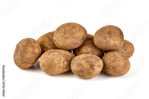 Unwashed potatoes  isolated on white background.