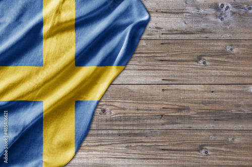 Wooden pattern old nature table board with Sweden flag