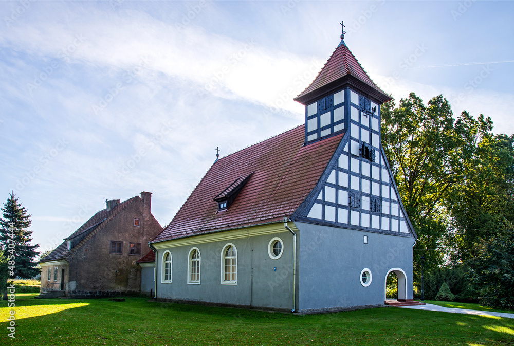Built in 1929, the Catholic Church of Saint Stanislaus the Bishop in the village of Szczecinki in Masuria, Poland. The lower part of the building is made of brick, the upper part is half-timbered with