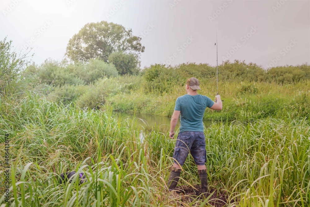 Fototapeta premium Summer fishing on the river.