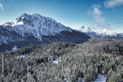 Wetterstein - winter landscape with snow covered mountains and forest  photo