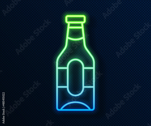 Glowing neon line Beer bottle icon isolated on blue background. Vector