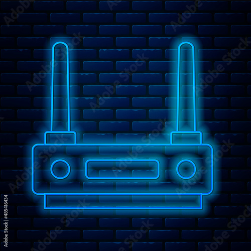 Glowing neon line Router and wi-fi signal icon isolated on brick wall background. Wireless ethernet modem router. Computer technology internet. Vector