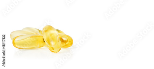 Heap of Omega 3 soft gel capsules isolated on white background. Copy space 