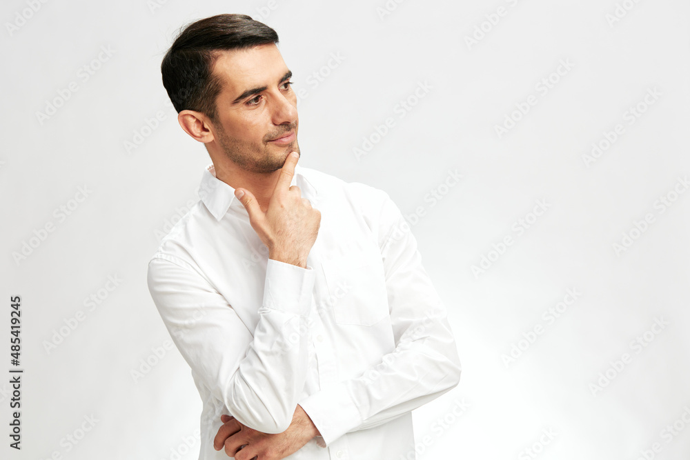 manager in a white shirt a pensive look self-confidence business and office concept manager in a white shirt a pensive look self-confidence business and office concept