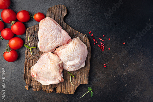 raw chicken thigh piece of poultry meat fresh portion dietary healthy meal food diet still life snack on the table copy space food background rustic top view