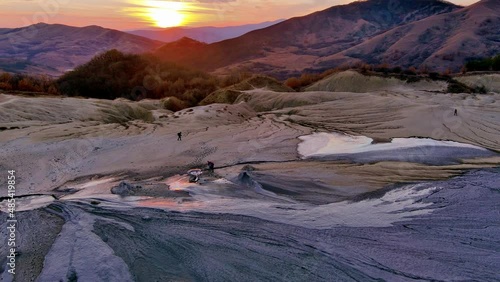 Aerial footage from drone with muddy volcano from Romanian mountains , Buzau county , Carpathian mountains , aerial landscape ,Paclele mici and Paclele Mari , vulcanii noroiosi 