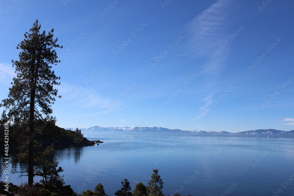 Lake Scene with Distant Mountains and Foliage Lake Scene with Distant Mountains and Foliage
