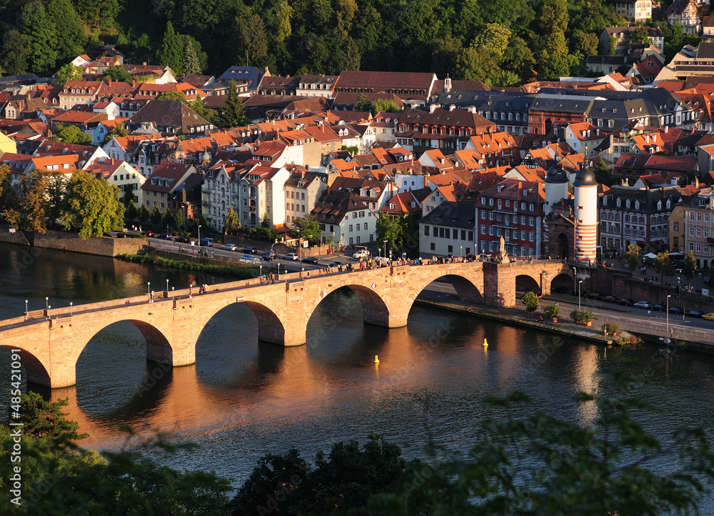 View To The Old Neckar Bridge In The Historic City Of Heidelberg Germany On A Beautiful Sunny Summer Day