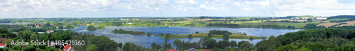 Panorama View from The Parnass Tower To The Lake Of Ploen Germany On A Beautiful Sunny Summer Day With A Blue Sky And A Few Clouds