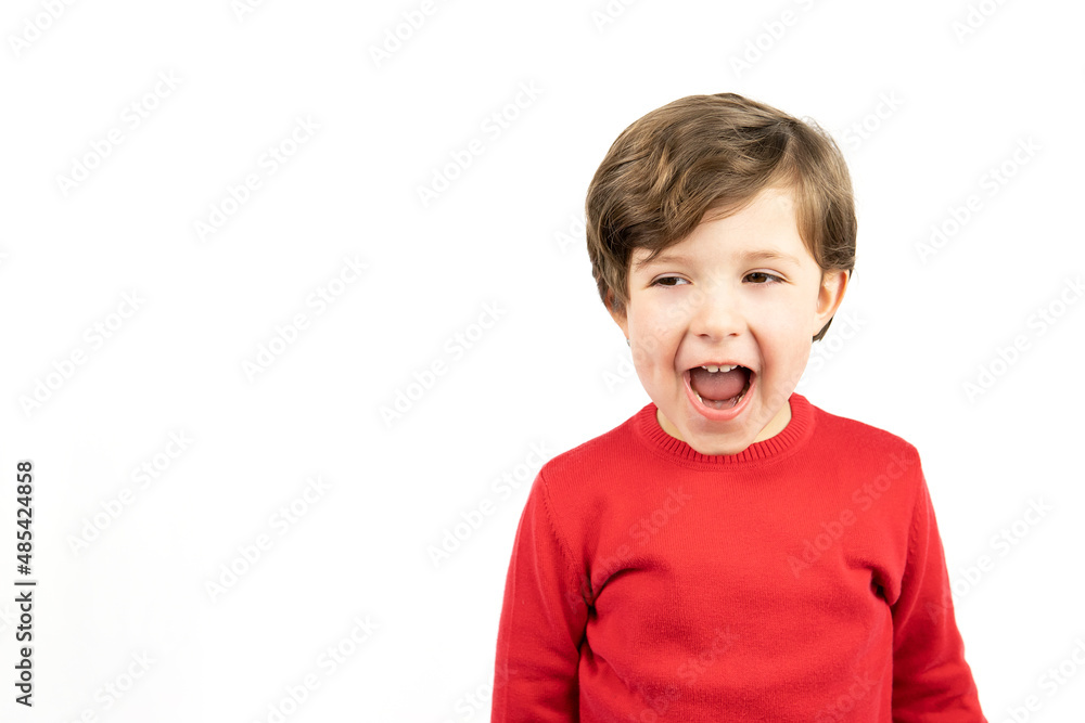 Happy child laughing on white background. Copy space Happy child laughing on white background. Copy space