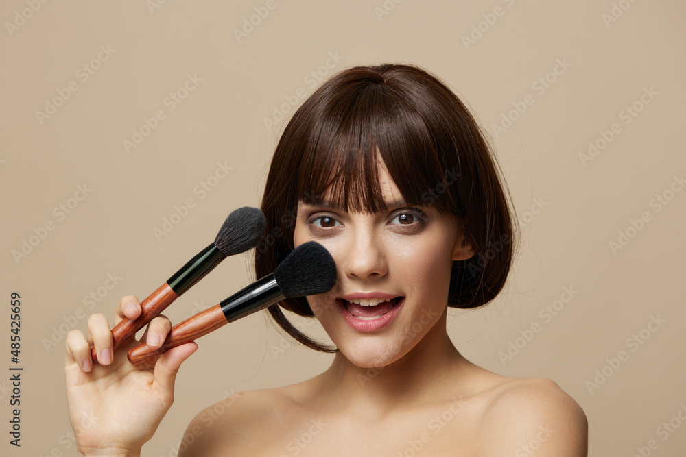 beautiful woman brushe cosmetics attractive look posing cropped view beautiful woman brushe cosmetics attractive look posing cropped view