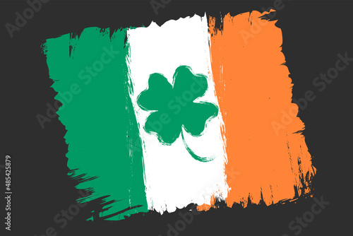 Vector vintage Ireland flag with lucky four leaf clover for Patrick's day.