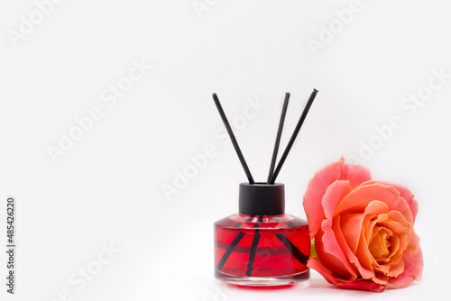 perfume for home, rose flower isolated on white background