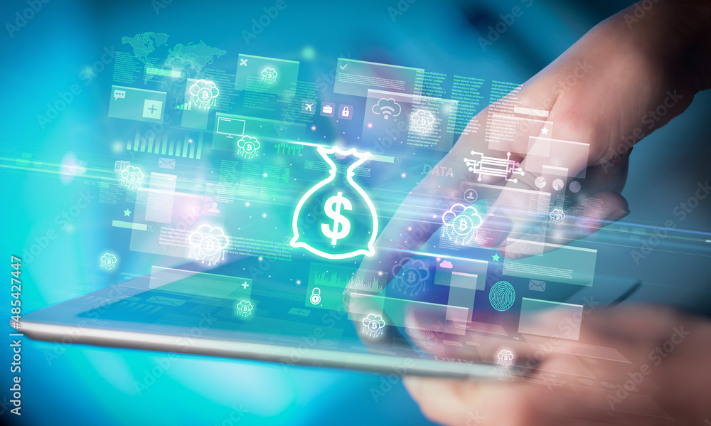Close-up of a hand using tablet, currency concept Close-up of a hand using tablet, currency concept