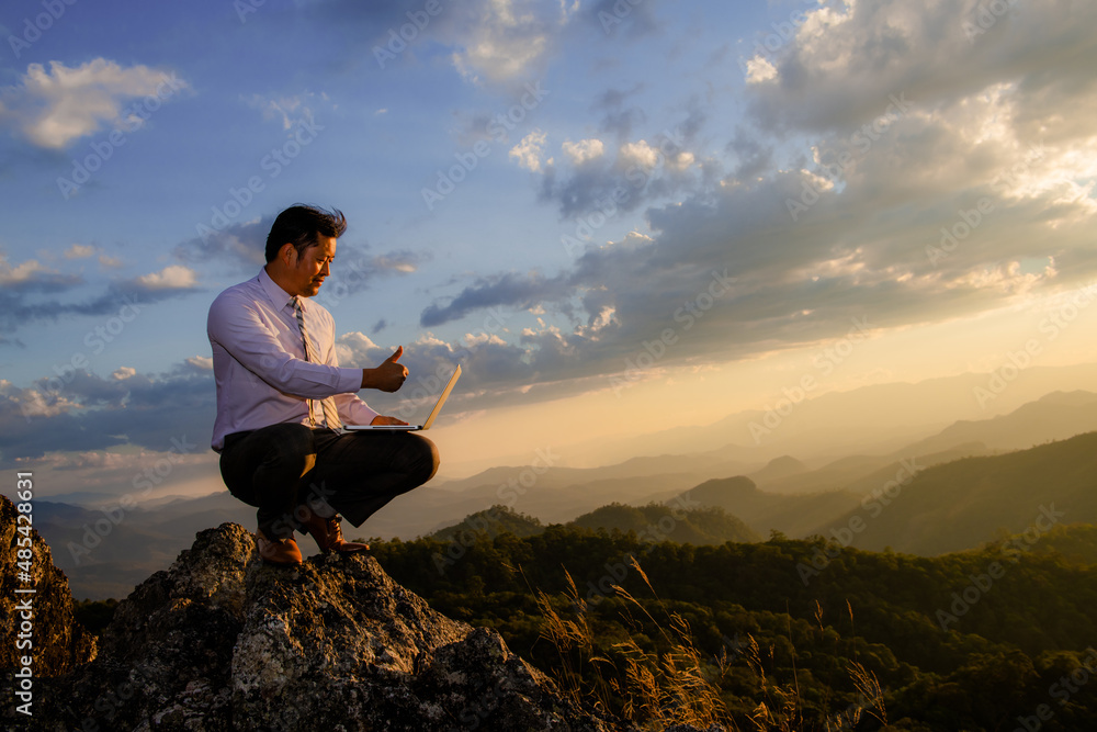 business man working outdoors wirelessly with laptop business man working outdoors wirelessly with laptop