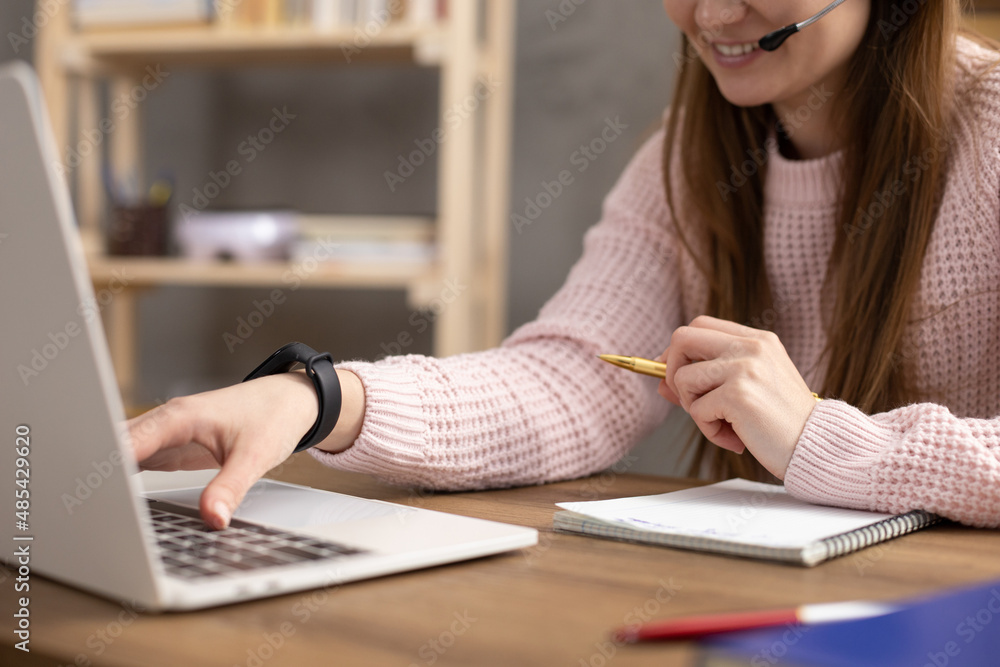 Girl writing in notebook noting thinking idea solitions. Student woman online larning Girl writing in notebook noting thinking idea solitions. Student woman online larning
