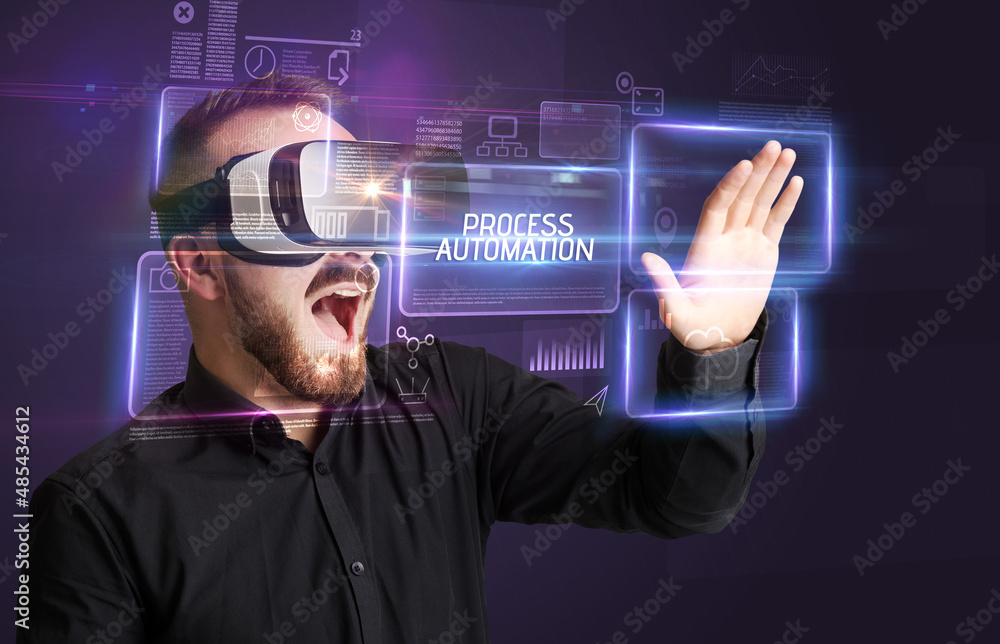 Businessman looking through Virtual Reality glasses, tech concept Businessman looking through Virtual Reality glasses, tech concept
