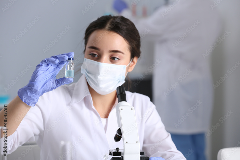 Scientist working with sample in chemical laboratory