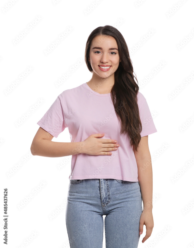 Happy healthy woman touching her belly on white background Happy healthy woman touching her belly on white background