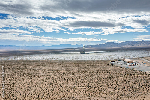 Drone panorama over Ivanpah solar thermal power plant in California during daytime sunshine photo