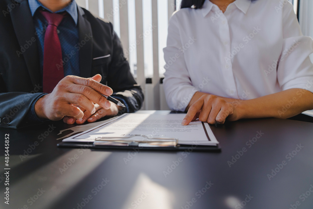 Fototapeta premium Businessman consulting with real estate broker about insurance broker contract agreement for home insurance, home buying and selling ideas and insurance