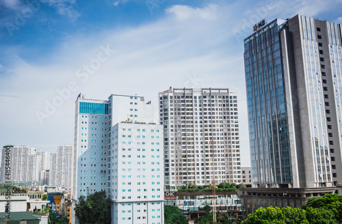 High-rise buildings in Hanoi in the blue sky. Including concrete and glass buildings and buildings under construction. 