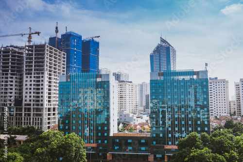 High-rise buildings in Hanoi in the blue sky. Including concrete and glass buildings and buildings under construction. 