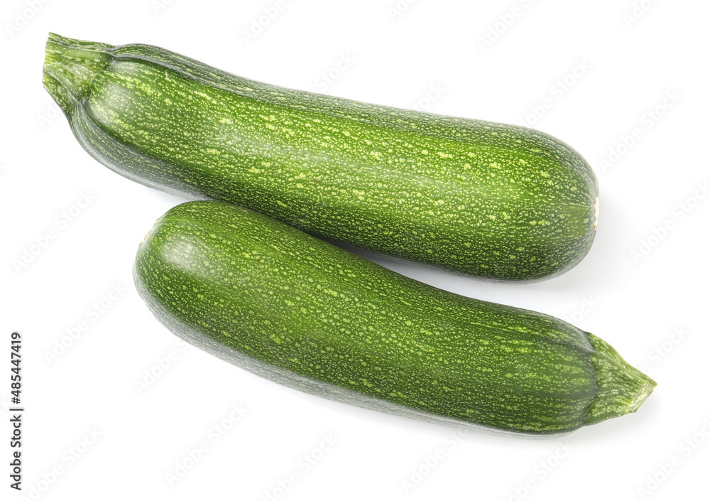 Raw ripe zucchinis on white background, top view Raw ripe zucchinis on white background, top view