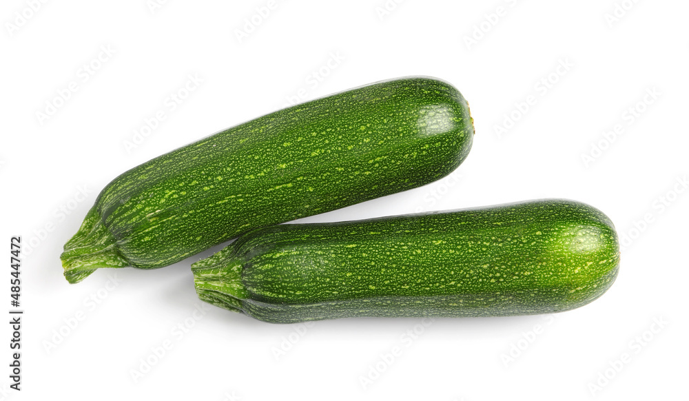 Raw ripe zucchinis on white background, top view Raw ripe zucchinis on white background, top view