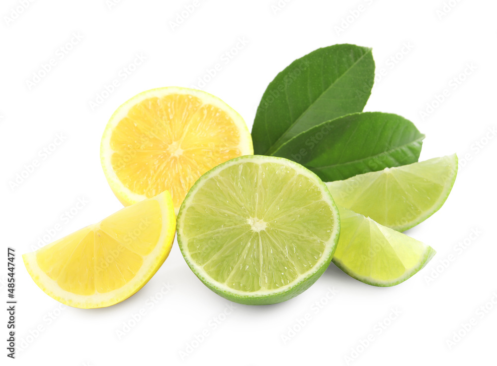 Cut fresh ripe lemon, lime and green leaves on white background