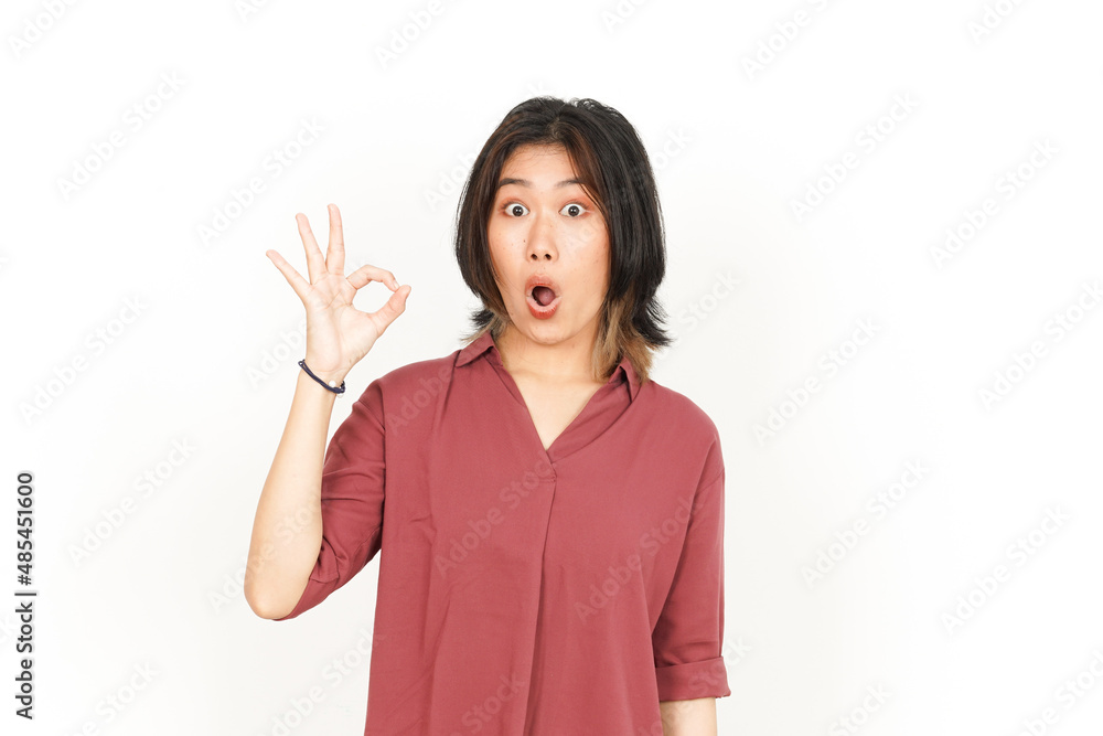 Showing OK Sign Of Beautiful Asian Woman Isolated On White Background Showing OK Sign Of Beautiful Asian Woman Isolated On White Background