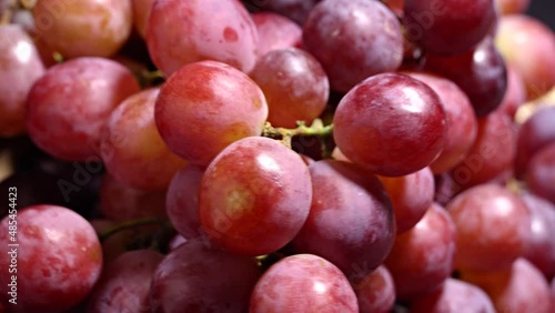 Fresh red grapes rotation background