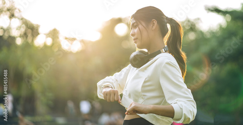 Portrait sport asian beauty body slim woman warming up in sportswear relax and do fitness exercise with stretching workout before fitness training in park.Diet concept.Fitness and healthy