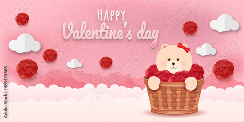 Bear in a basket with red roses