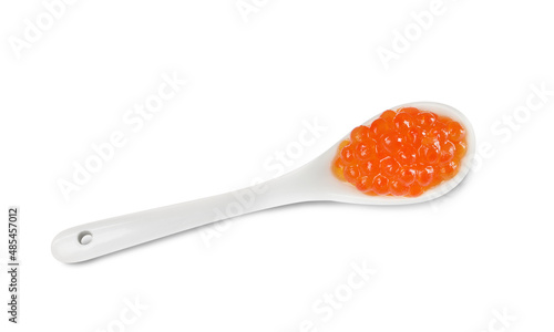Spoon with delicious red caviar isolated on white