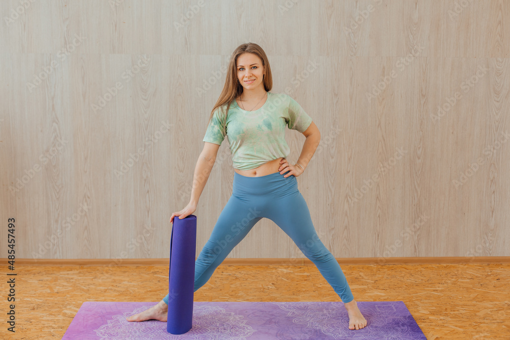 custom made wallpaper toronto digitalYoung caucasian woman doing yoga asanas with at home.