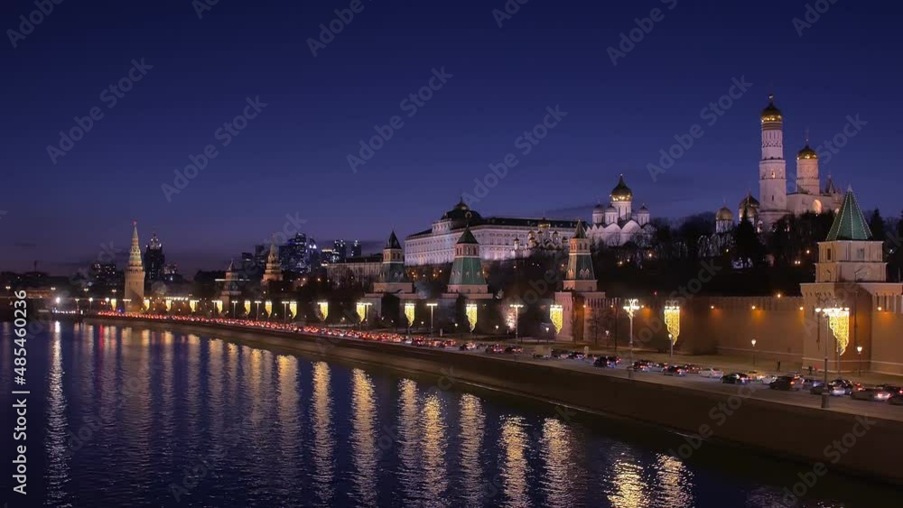 amazing night cityscape of center of Moscow, cars are moving over embankment of river amazing night cityscape of center of Moscow, cars are moving over embankment of river