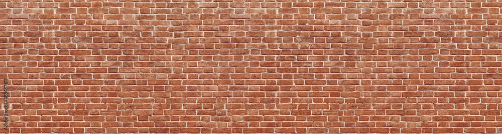 Fototapeta premium Old red brick wall background, wide panorama of masonry 