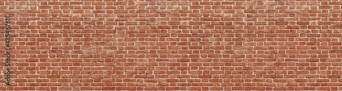 Old red brick wall background, wide panorama of masonry 
